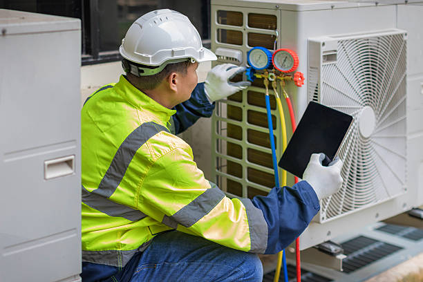 Professional Air Conditioning Repair technician working in Hudson, CO